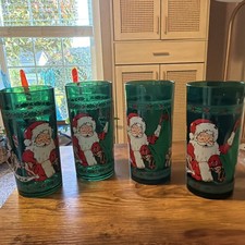 Set of (4) Vintage Santa Toys Plastic 6 Tall Santa Christmas Cups picture