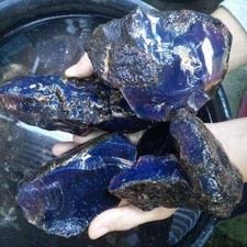 SMALL PIECES OF NATURAL UNTREATED HQ ROUGH BLUE AMBER SUMATRA INDONESIA picture