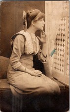 1910-20's RPPC WOMAN LOOKING out of WINDOW LEBANON PA REAL PHOTO POSTCARD picture