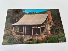 A Typical Cabin in the Heart of the Mountains Postcard picture