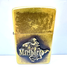 RARE VINTAGE 1984 c. MARLBORO ZIPPO RIDING COWBOY BRASS LIGHTER picture