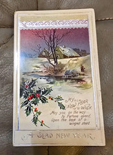 Vintage 1917 A GLAD NEW YEAR Embossed Postcard Posted w/ Stamp Divided Back picture