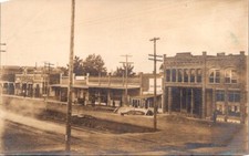 RPPC Postcard Main Street in Town Restaurant Train Tracks c.1904-1920s     12577 picture