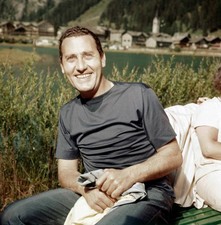 Italian actor and director Alberto Sordi smiling by a lake 1960s Old Photo picture