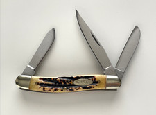 The CRKT 6063 Classic Stockman Burnt Amber Jig Bone Pocket Knife picture