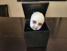 Vtg Gemmy Halloween Creepy Baby Face Box Toy Animated Push Button picture
