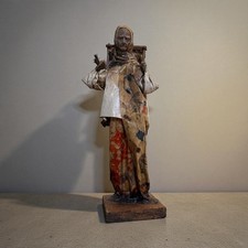 Mexican folk art paper mache figurine of an old village woman.  picture
