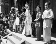 Chinese opera performers perform front of a local street crowd 1 1- Old Photo picture