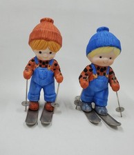 CCF1 Enesco Country Cousins Girl Boy Set Of 2 Skiing Figurines Holiday picture