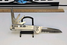 Leatherman FREE K4 Pocketknife Plain Edge Drop Point Liner Lock Silver Retired picture