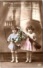 c1910 NEW YEAR GREETINGS TO AN OLD FRIEND CHILDREN TINTED EAS POSTCARD 42-319 picture