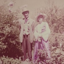 Vintage Color Photo Snapshot of Older Couple in Fancy Clothes in Garden picture