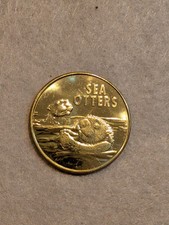 Ripley's Aquarium of Myrtle Beach Brass Souvenir Sea Otters  picture