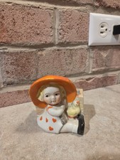 Vintage Japan Glazed Ceramic Girl Figurine Orange Hat Hearts Small. AS IS. picture