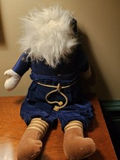 Woof And Poof Santa Couch Sitter—Blue Coat with Gold Stars picture