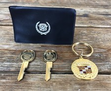 Vintage Gold Cadillac Key & Keychain Set w/Case 1980s picture