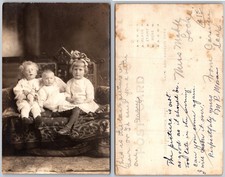 RPPC Three Children On Sofa Photo Postcard picture