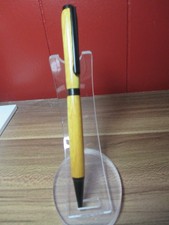 HAND TURNED OSAGE ORANGE WOOD SLIMLINE PEN WITH BLACK TRIM picture