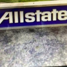 Vintage Allstate Light Up Can Sign Hung On Side Of Building  picture