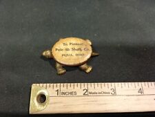 THE PIONEER POLE & SHAFT CO CAST IRON CELLULOID TURTLE PAPERWEIGHT ADVERTISEMENT picture