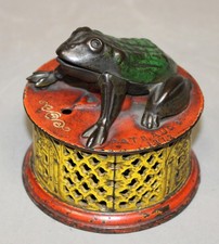 Antique Cast Iron Frog on Lattice Mechanical Bank picture