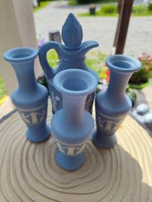 Avon Blue Glass Bottle with Classical Figures, Stopper Lid Filled, 1979 picture