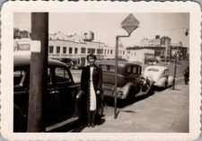 Woman on City Street with Royal Furniture Co Sign 1930s Photograph picture