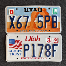 LOT OF 2 Utah License Plates Delicate Arch Life Elevated / In God We Trust picture