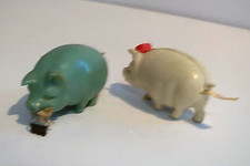 VTG WHITE PLASTIC & GREEN PLASTIC PIG SEWING TAPE MEASURES picture