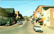 Bracebridge, Ontario Canada  MAIN STREET SCENE  Stores & 50's Cars  Postcard picture