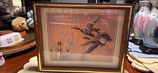 Beautiful vintage wildlife wall clock featuring a ducks-in-flight print picture