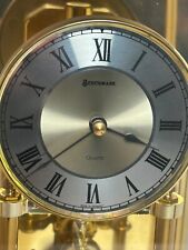 BENCHMARK QUARTZ ROTATING PENDULUM GLASS ANNIVERSARY CLOCK MADE IN GERMANY Works picture