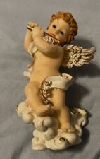 Baby Angel On A Cloud Playing A Flute Figurine picture