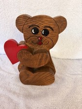 Vintage Wooden Teddy Bear Holding a Heart picture