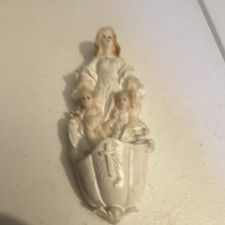 This item is a vintage guardian angel holy water font wall pocket. picture