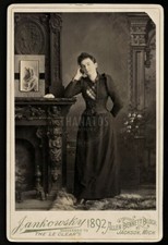 1890s photo michigan girl in dark dress posing w' woman's photo - mourning? PIP picture