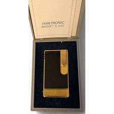 Vintage 20 th French FLAME Ultra Flat Lighter gold and black lacquer picture