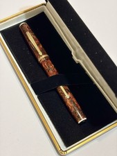 Vintage 1950s Wearever Supreme Fountain Pen - Red Onyx Marble Celluloid. SS Nib. picture