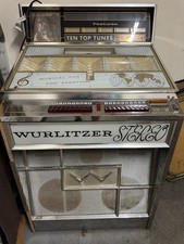 Wurlitzer Stereo Jukebox Machine with “Ten Top Tunes” Header picture