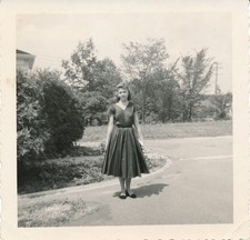 Young Pretty Woman Wearing a Fashionable Dress 1950s vintage snapshot photo picture