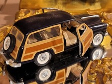 Kahuna's Klassics Diecast Scale 1/28 Model 1949 Ford Woody Wagon SS7737 picture