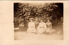 Postcard Real Photo RPPC Women Sitting on Ground in Front of Vines picture