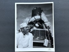 1963 NASA Astronaut L. Gordon Cooper, Jr., Rests Mercury Spacecraft Photograph picture