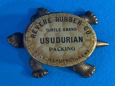 Vintage Cast Iron & Celluloid Advertising Turtle Paperweight Usudurian Packing picture