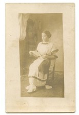 RPPC Young Woman Reading Letter Real Photo Postcard picture