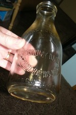 RARE IN MINT CONDITION 1921 ECONOMY DAIRY QUART MILK BOTTLE GRAND RAPIDS MI. picture