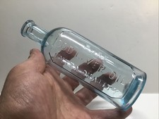 Round Antique Pure Cod Liver Oil Extra Quality Medicine Bottle. picture