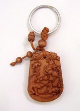 Classic Peach Wood Delicate Carved Key Chain picture