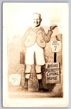 Humorous RPPC Broke But Happy Coming Home Ark. State 7 Miles Caricature Postcard picture