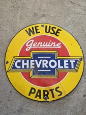 VINTAGE WE USE GENUINE CHEVROLET PARTS  PORCELAIN SIGN 12